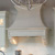 A cast stone hood for any space